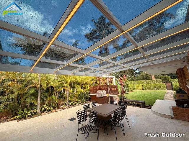 Fresh Outdoor project: Clear-roof pergola over an outdoor dining area